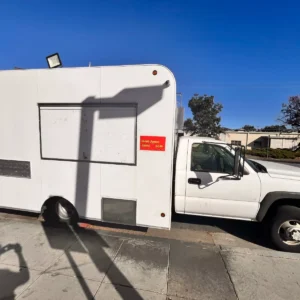 A 24-foot, fully equipped 2006 Chevy food truck for sale in the Bay Area